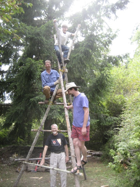 three generations building tripod tower